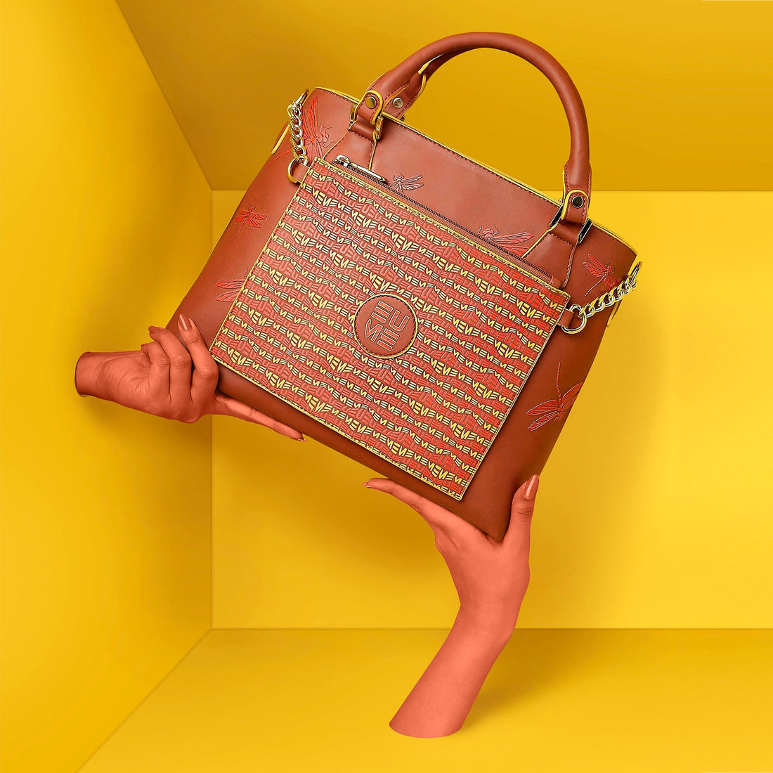 Stylish Skimmer Tote Handbag on a vibrant yellow background.