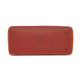 Bottom view of Spreadwing Tote Handbag in rich red leather.
