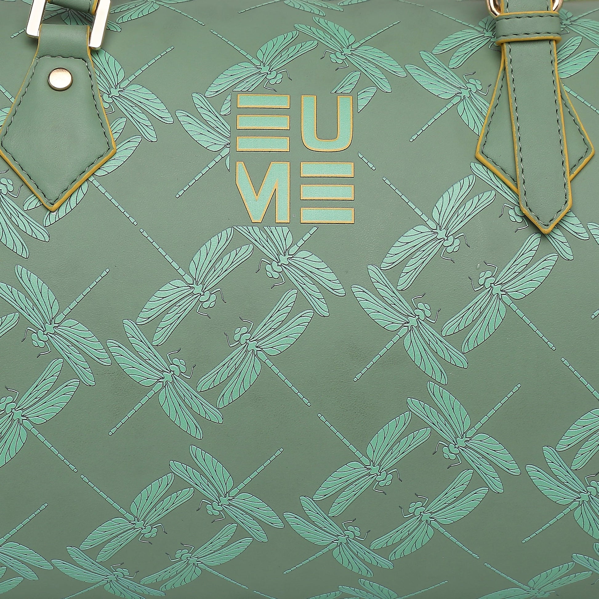 Chopper Duffel Bag with dragonfly pattern and logo design.