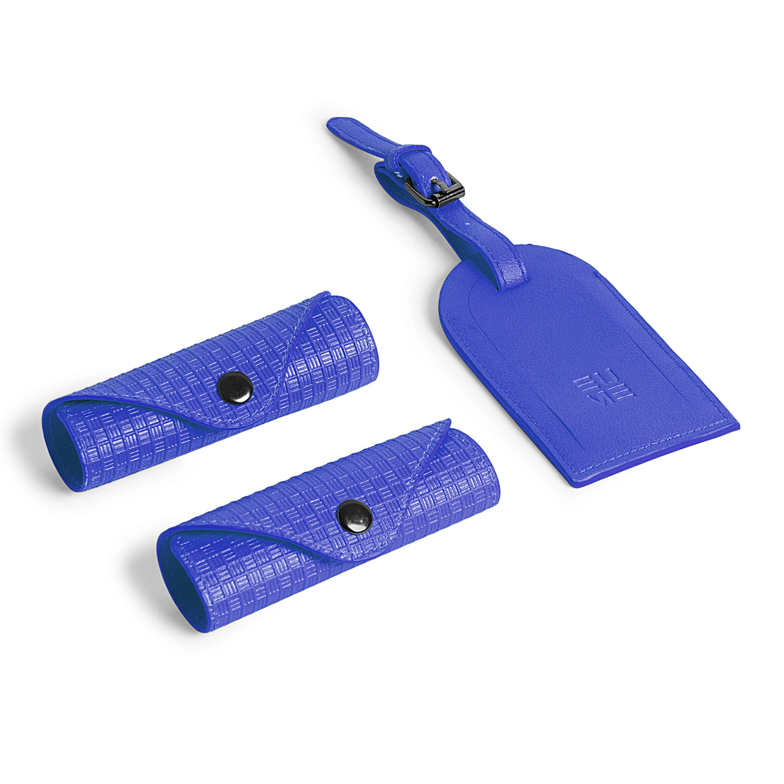 Blue accessory kit featuring stylish pouches and luggage tag.