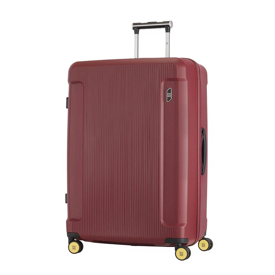 Nomad Set of 3 stylish maroon luggage with smooth-rolling wheels.