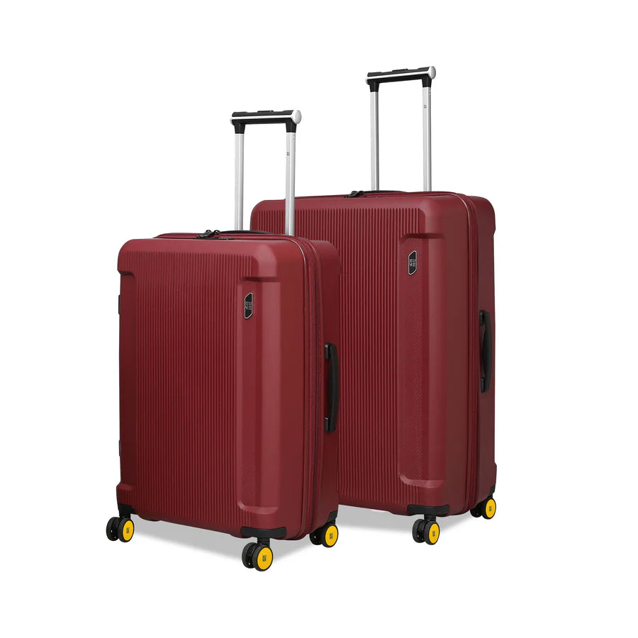 Stylish red Nomad Cabin luggage set with wheels and extending handles.