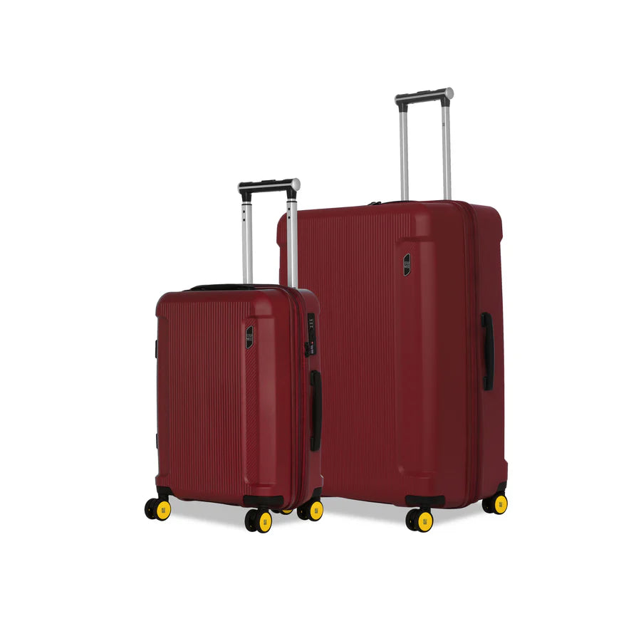 "Nomad Cabin stylish red luggage set with smooth wheels."