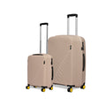 Wanderer Set of 3 stylish luggage in beige color with yellow wheels.