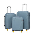 Wanderer Cabin + Check-In Medium blue luggage set with wheels.