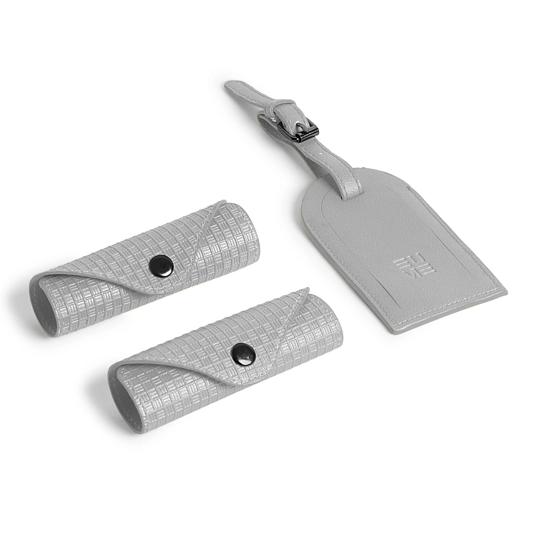 Grey accessory kit with two holders and luggage tag.