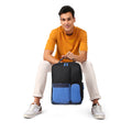 Eclipse 20L Laptop Backpack modeled by a man in casual attire.