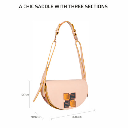Stylish Pecan Saddle Bag with three spacious sections and adjustable strap.