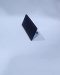 Black customization plate for personalized labeling or signage.