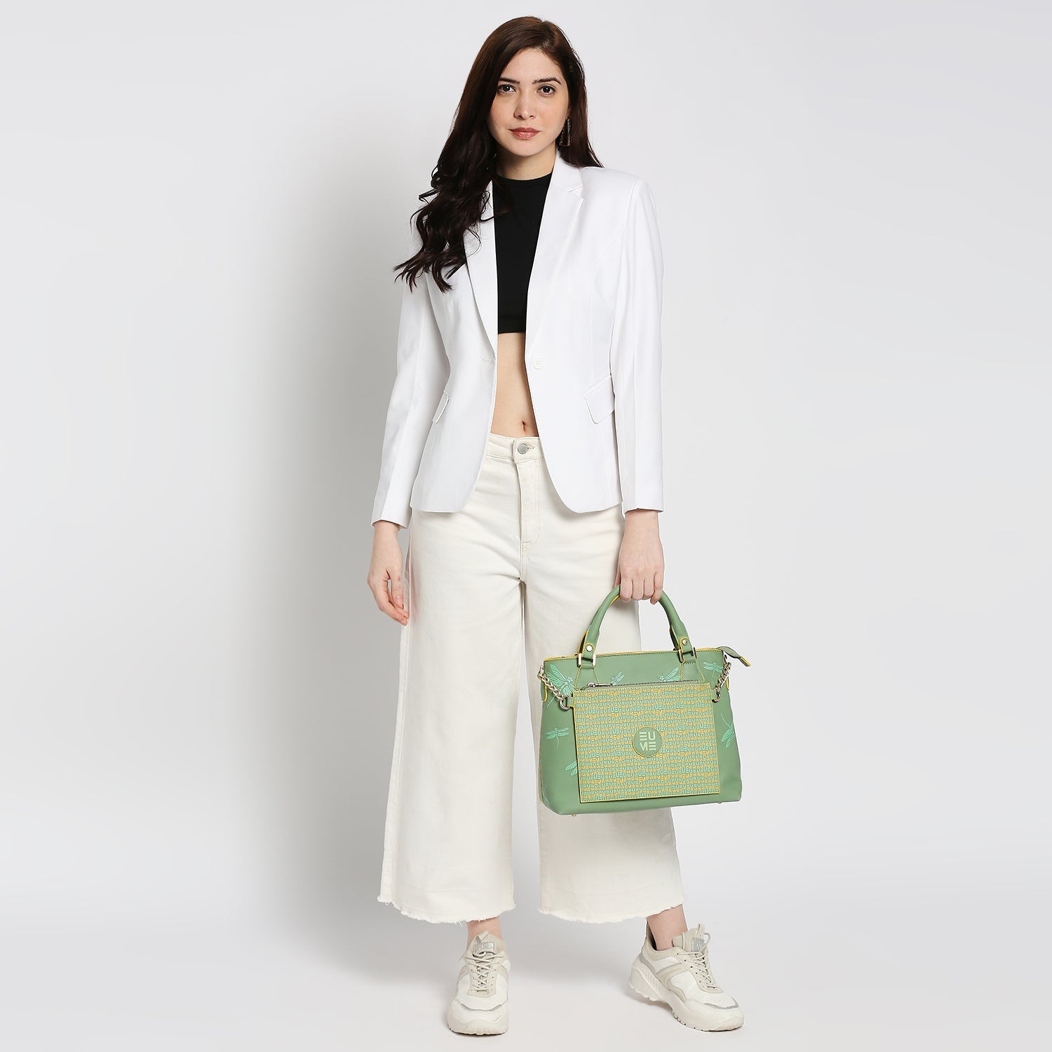 Stylish Skimmer Tote Handbag paired with chic white outfit.