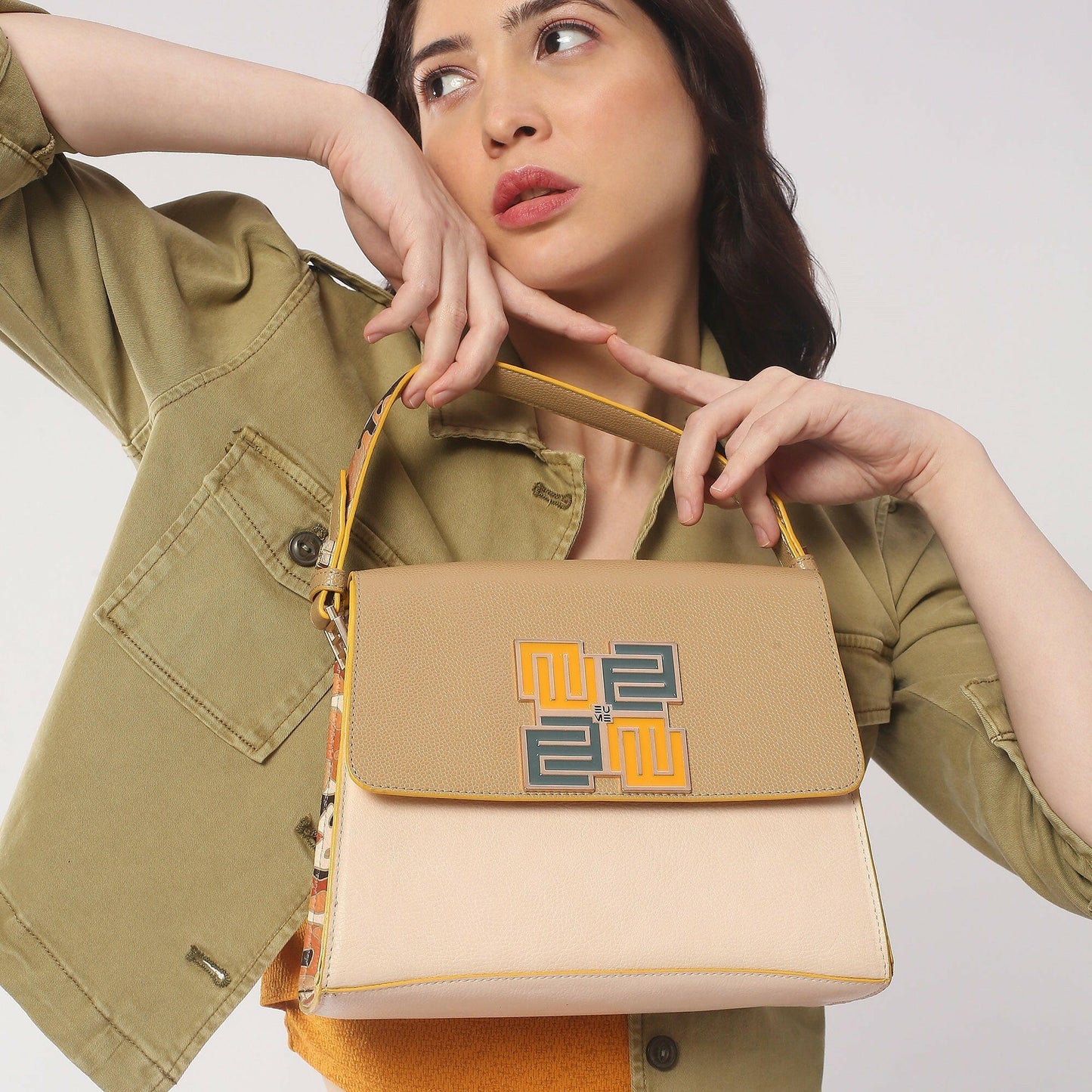"Stylish Espresso Satchel Bag held by a model, perfect for any occasion."