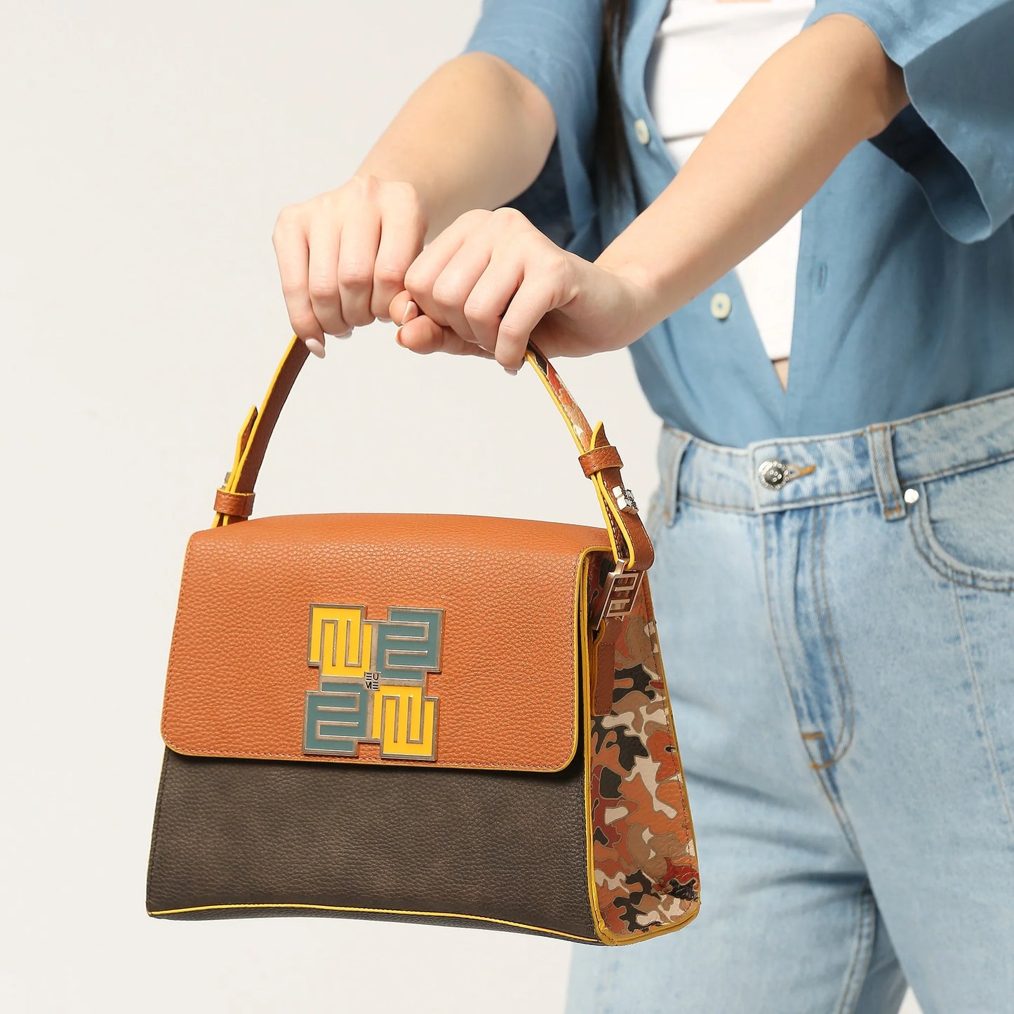Espresso Satchel Bag with stylish dual-tone design and patterned strap.