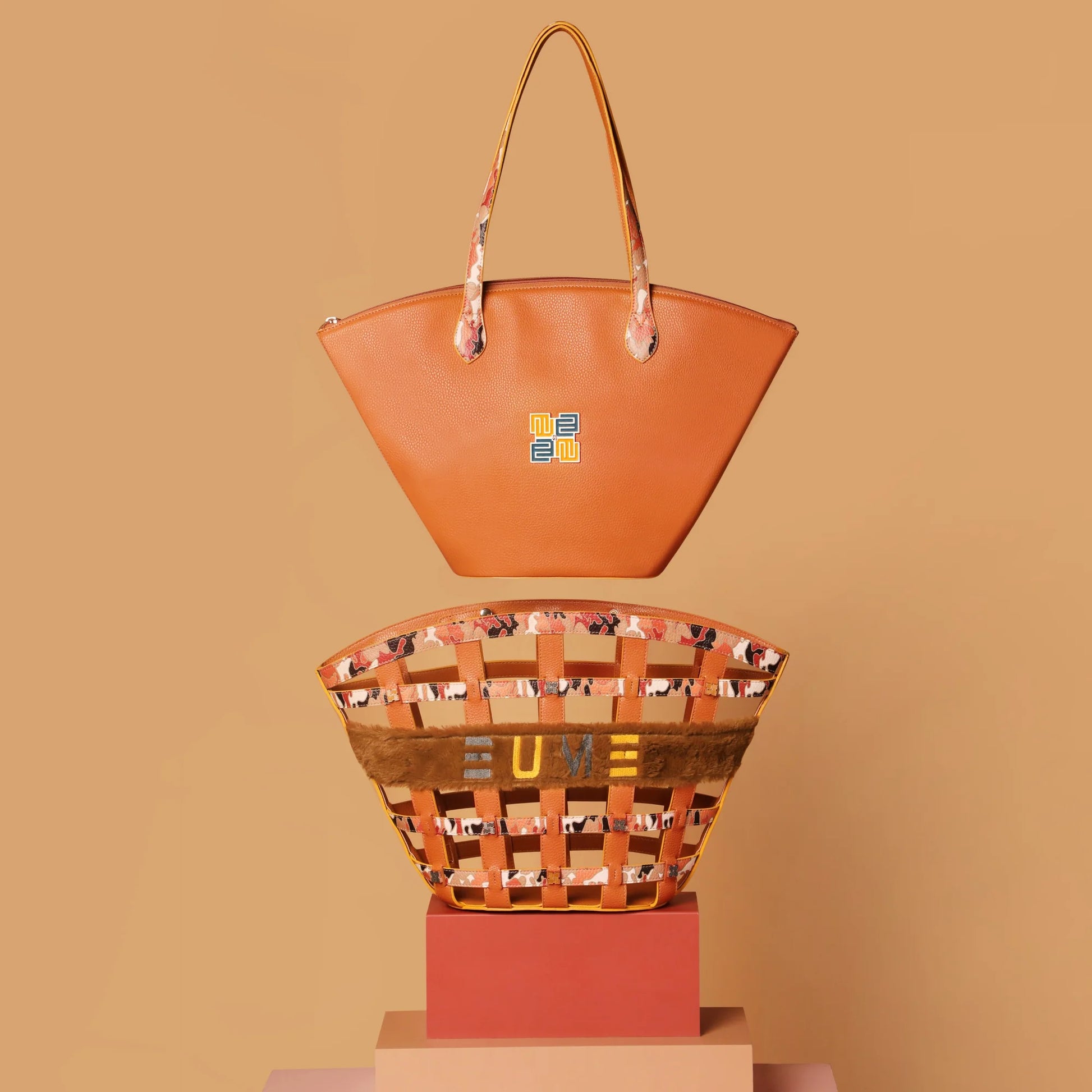 Stylish Praline Tote Bag displayed against a warm backdrop.