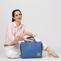 Daffodil Satchel Laptop Handbag styled with casual outfit and bright smile.