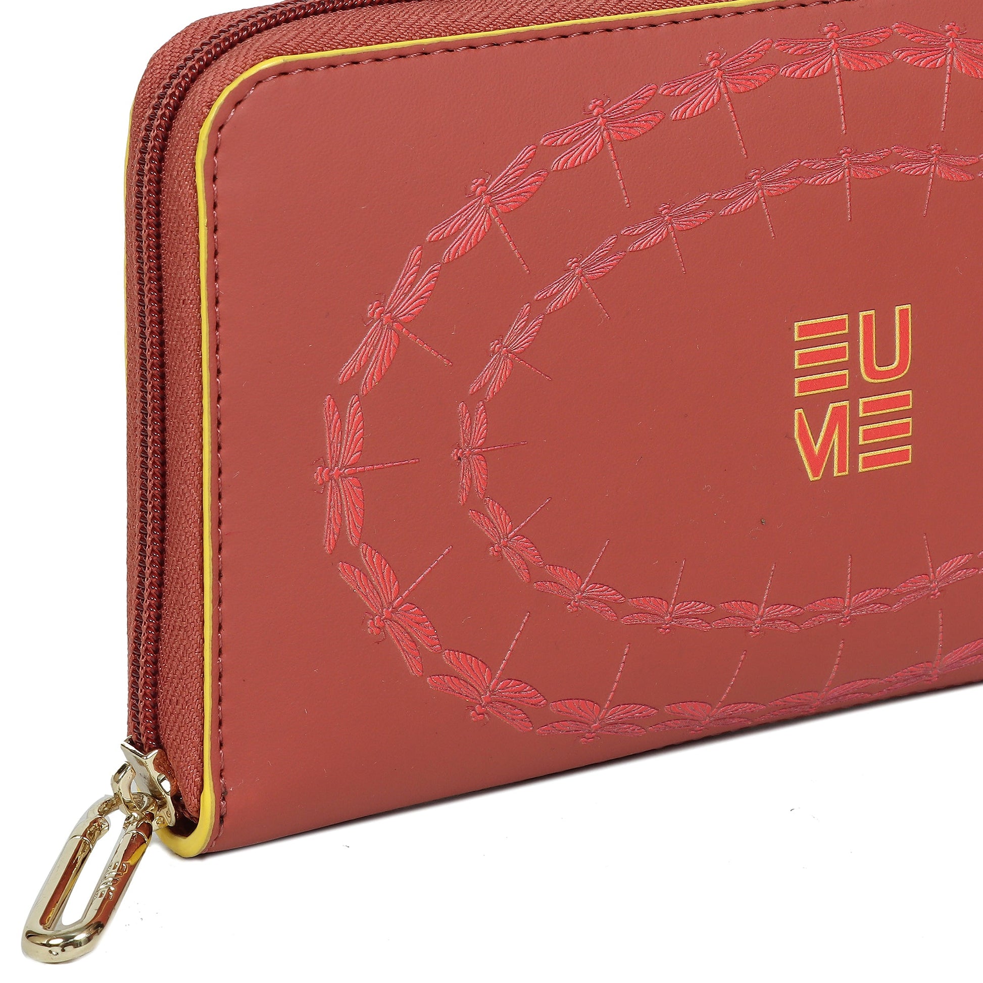 EUME Bandwing Clutch with elegant dragonfly design and gold accents.