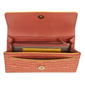 EUME Firefly Clutch interior showing card slots and zippered compartments.