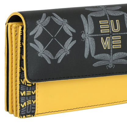 EUME Ladybug Clutch in black and yellow with dragonfly design.