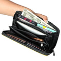 EUME Shaffronwing Clutch with cash and card compartments.