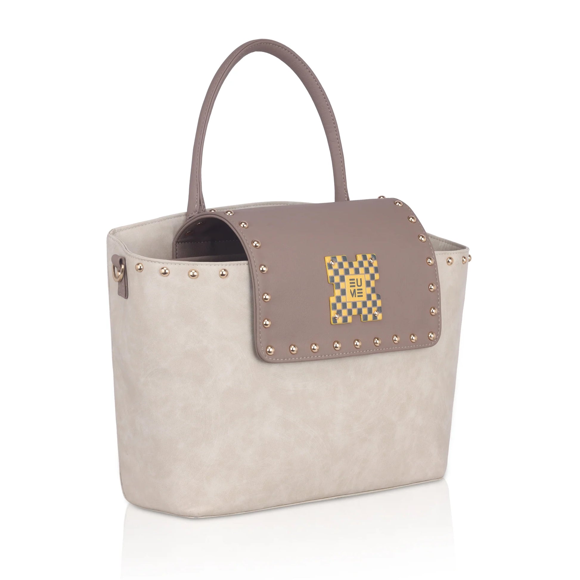 Orchid single sling laptop tote bag with stylish studs and panels.