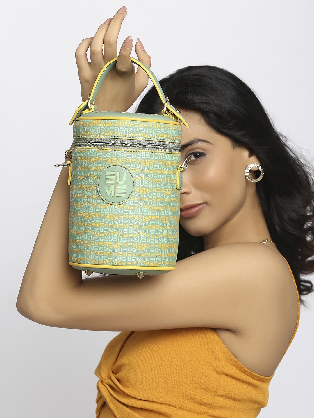 Stylish Picassu Cosmetic Bag held by a model.