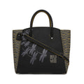 Stylish Spreadwing Tote Handbag with dragonfly design and bold colors.