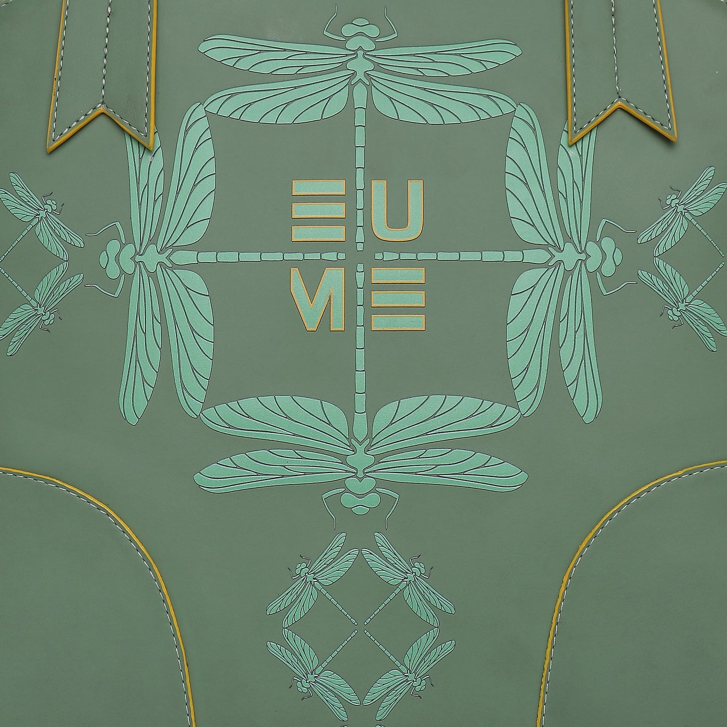 Luna Bowling Handbag with dragonfly motif and bold lettering design.