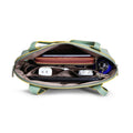 Interior view of the Luna Bowling Handbag with organized compartments.