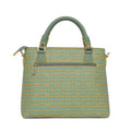 Skimmer Tote Handbag in green and gold geometric pattern.