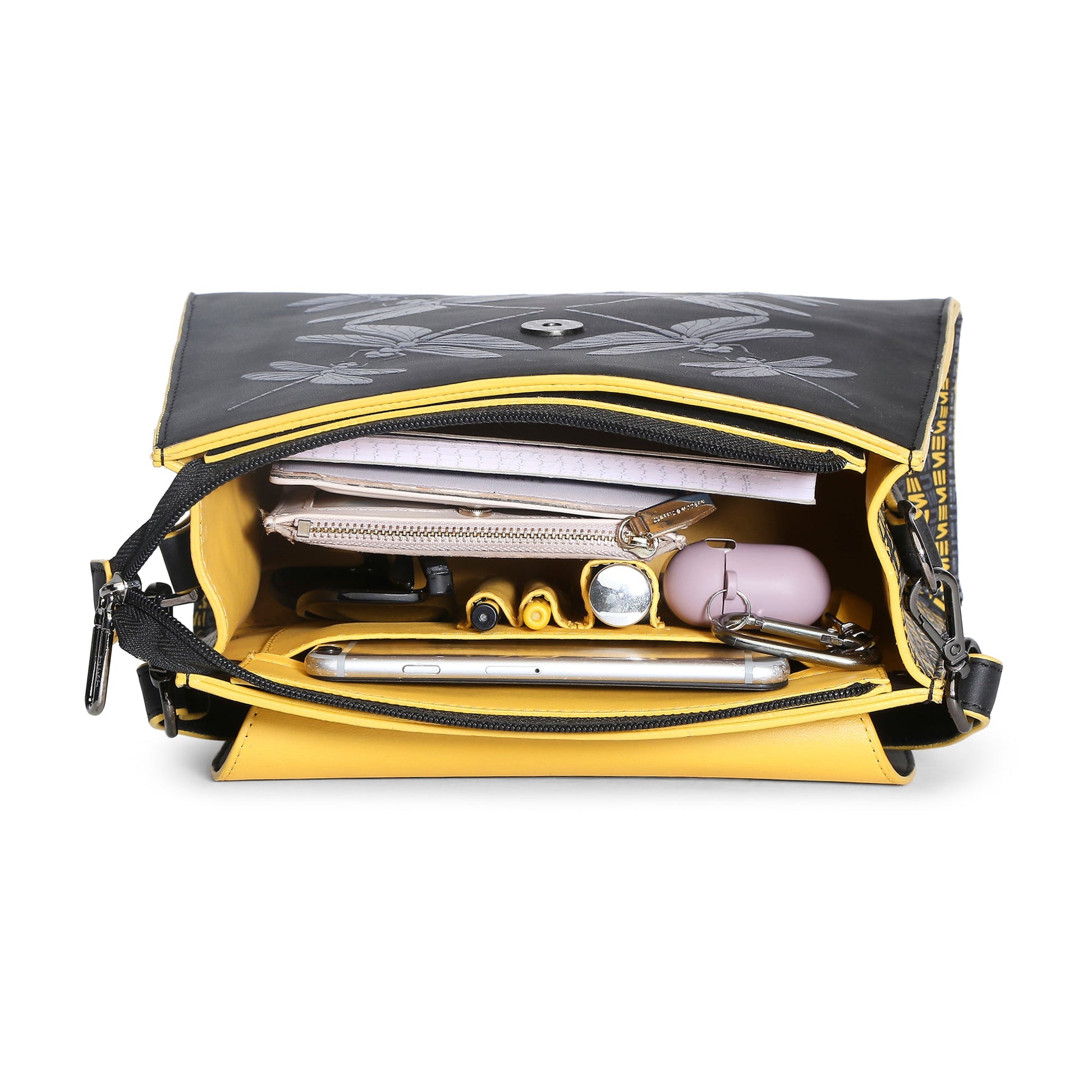 Spike-tail Satchel Handbag open with organized interior and essentials inside.