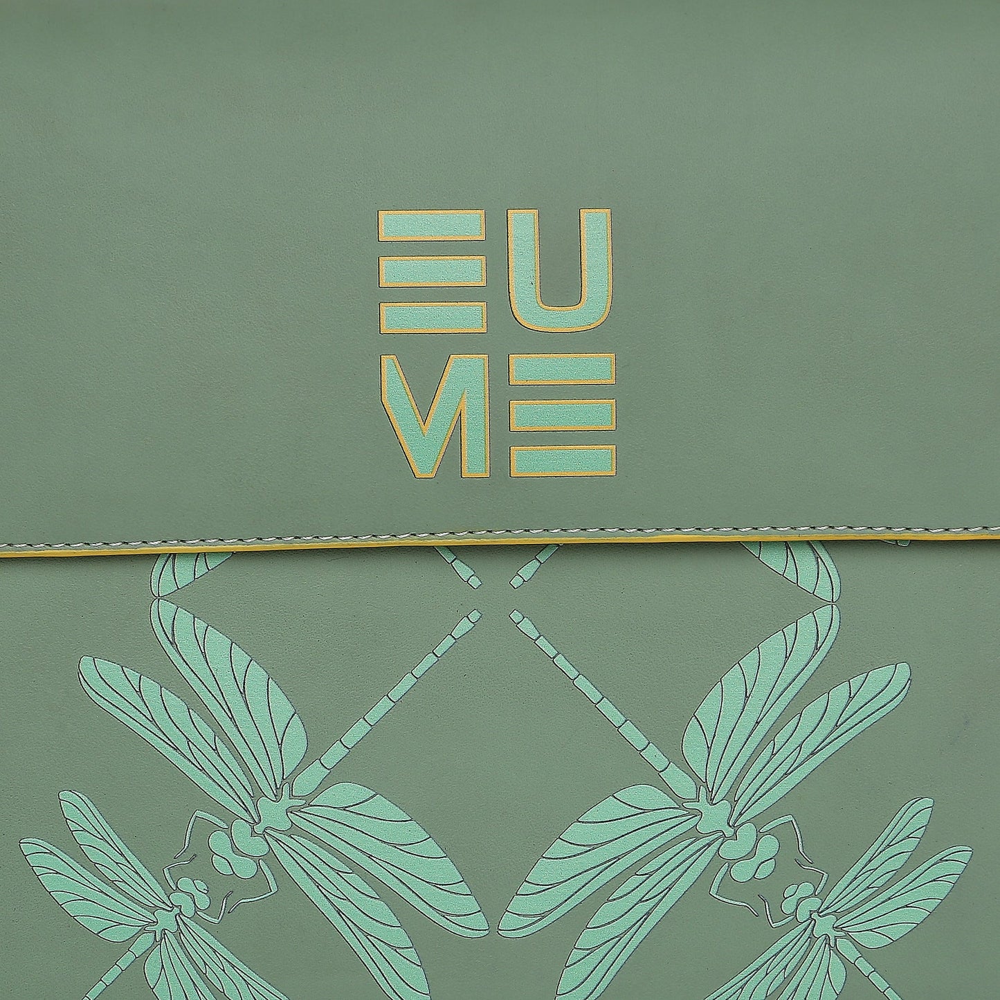 Spike-tail Satchel Handbag with dragonfly design in green leather.