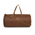 Chopper Duffel Bag in brown with stylish woven design and adjustable strap.