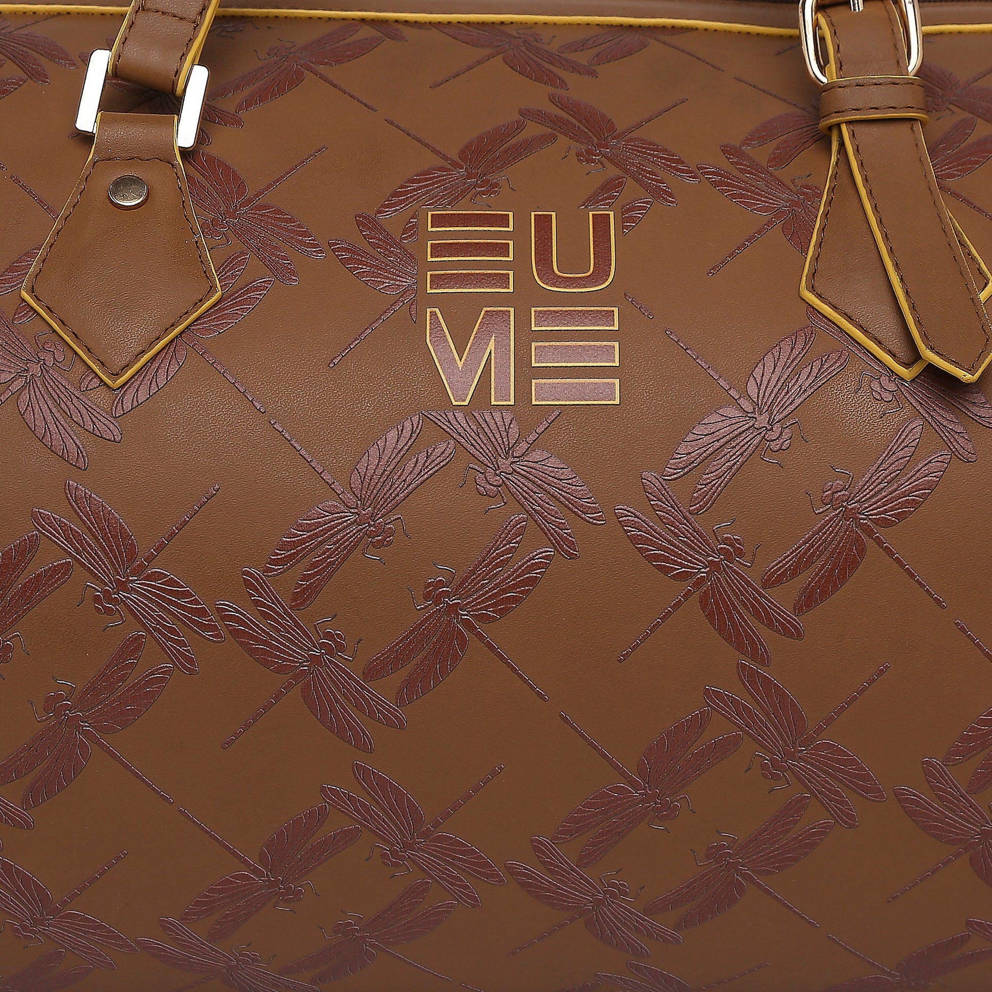 Chopper Duffel Bag with embossed dragonfly pattern and logo.