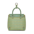 Petal-tail Sling Handbag/Backpack in green with floral design.