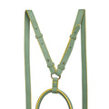 Petal-tail sling handbag and backpack with green and yellow straps.