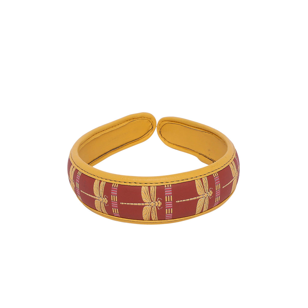Gabbi Hairband with dragonfly print in warm colors.