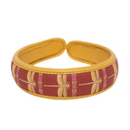 Stylish Gabbi Hairband with dragonfly design and vibrant colors.
