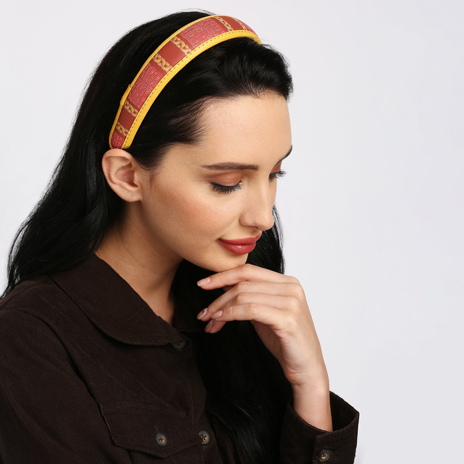 Lola Hairband worn by a woman with dark hair.