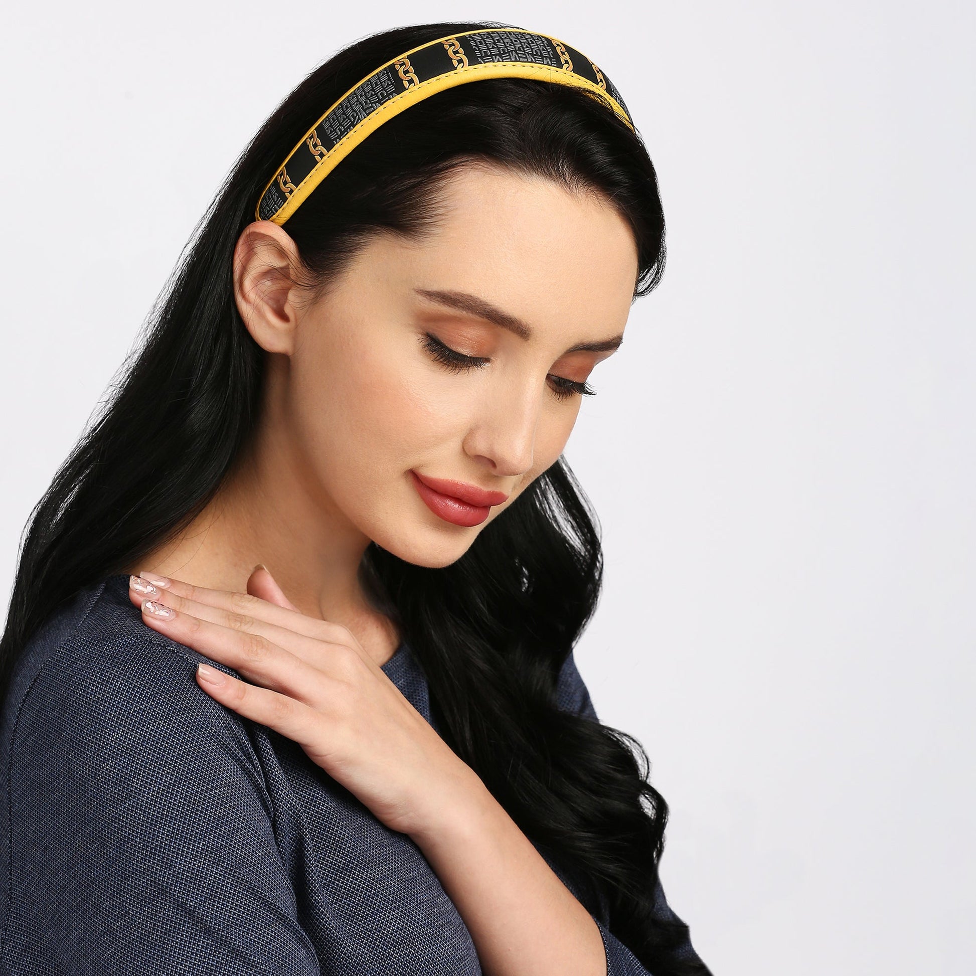 Lola Hairband on model, showcasing stylish design and elegant look.