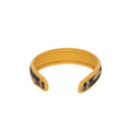 Stylish yellow and black Peppy hair band with floral design.