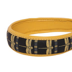 Gabbi Hairband with dragonfly pattern on black and yellow design.