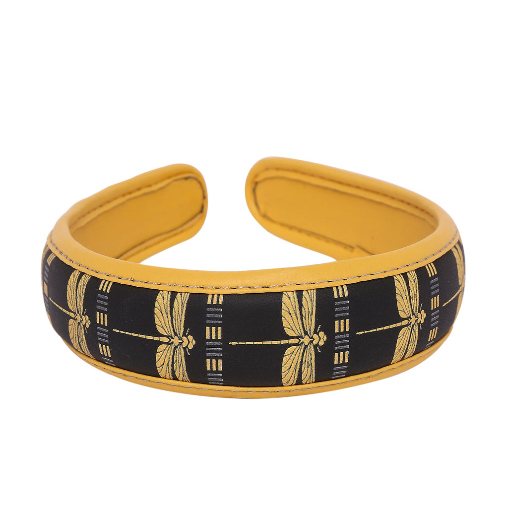 Stylish Gabbi Hairband with dragonfly design and vibrant yellow accents.