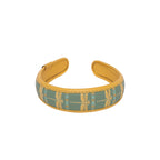 Stylish Gabbi Hairband with dragonfly pattern and yellow trim.
