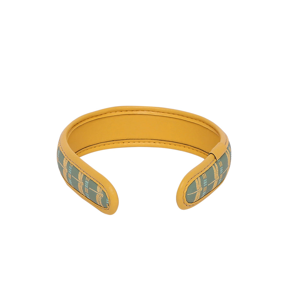 Stylish Gabbi Hairband in yellow with teal patterned detail.