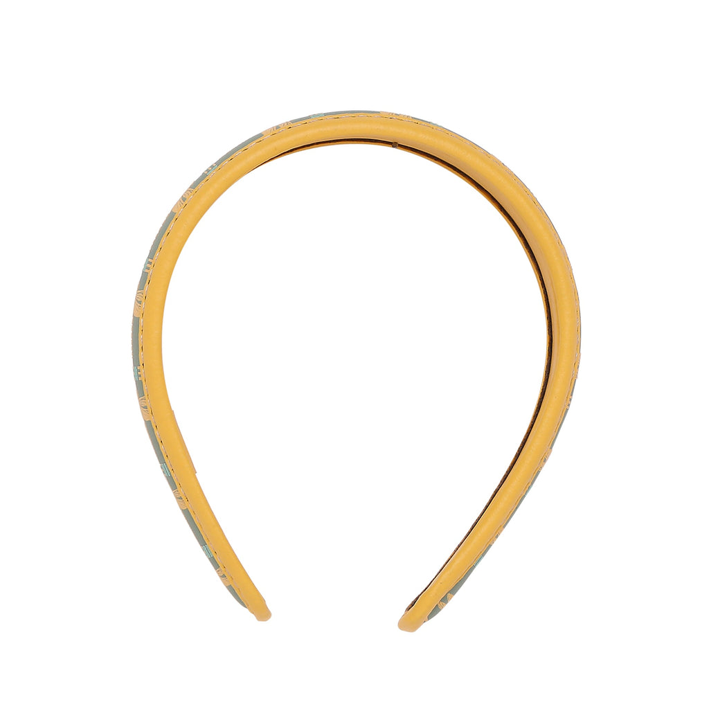 Gabbi Hairband in vibrant yellow and patterned design.