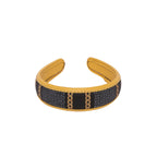 Lola Hairband in vibrant yellow and stylish black pattern.