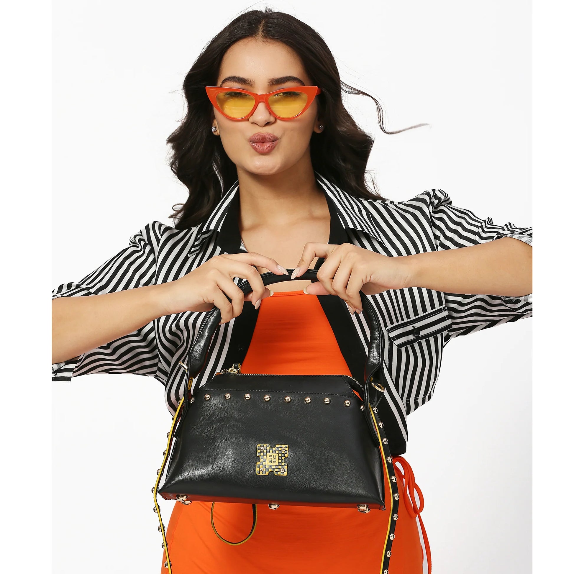 Stylish Rose Tote Handbag displayed by model with sunglasses.