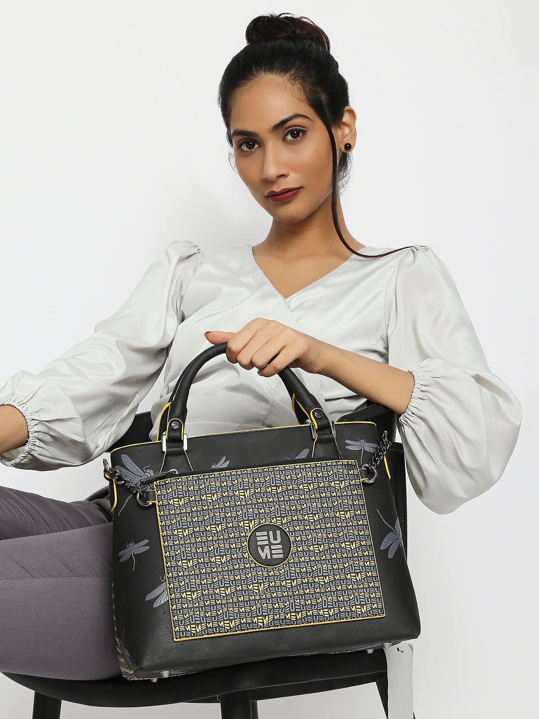 Elegant Skimmer Tote Handbag with stylish design and practical functionality.