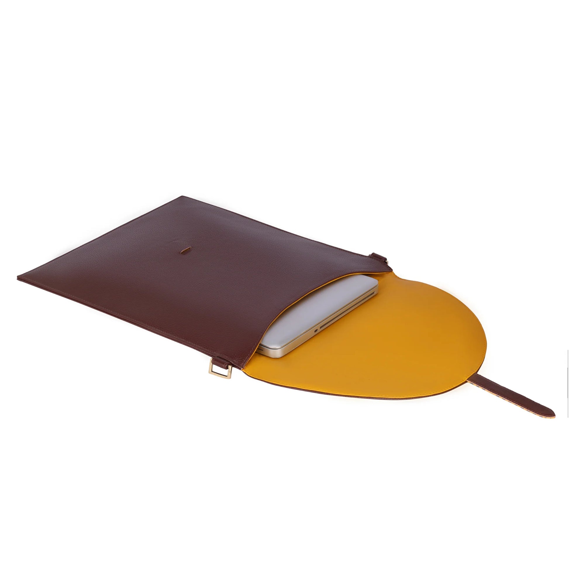 Hibiscus Laptop Sleeve in brown leather with yellow interior and laptop.