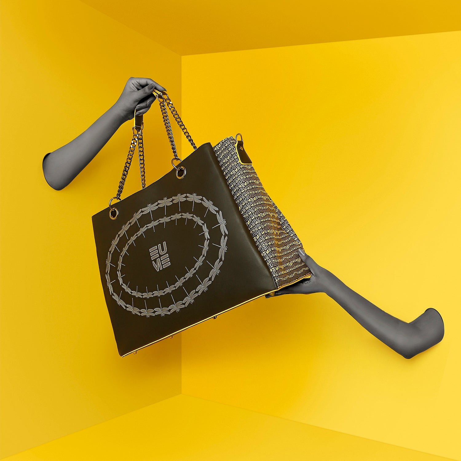 Flapper Laptop Handbag showcased with vibrant yellow background.