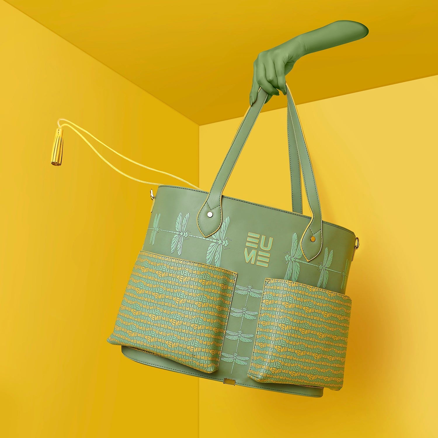 Clubtail Bucket Bag in green with dragonfly design and stylish straps.